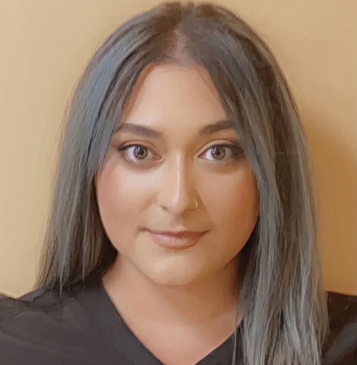 Person with long hair against a beige background.