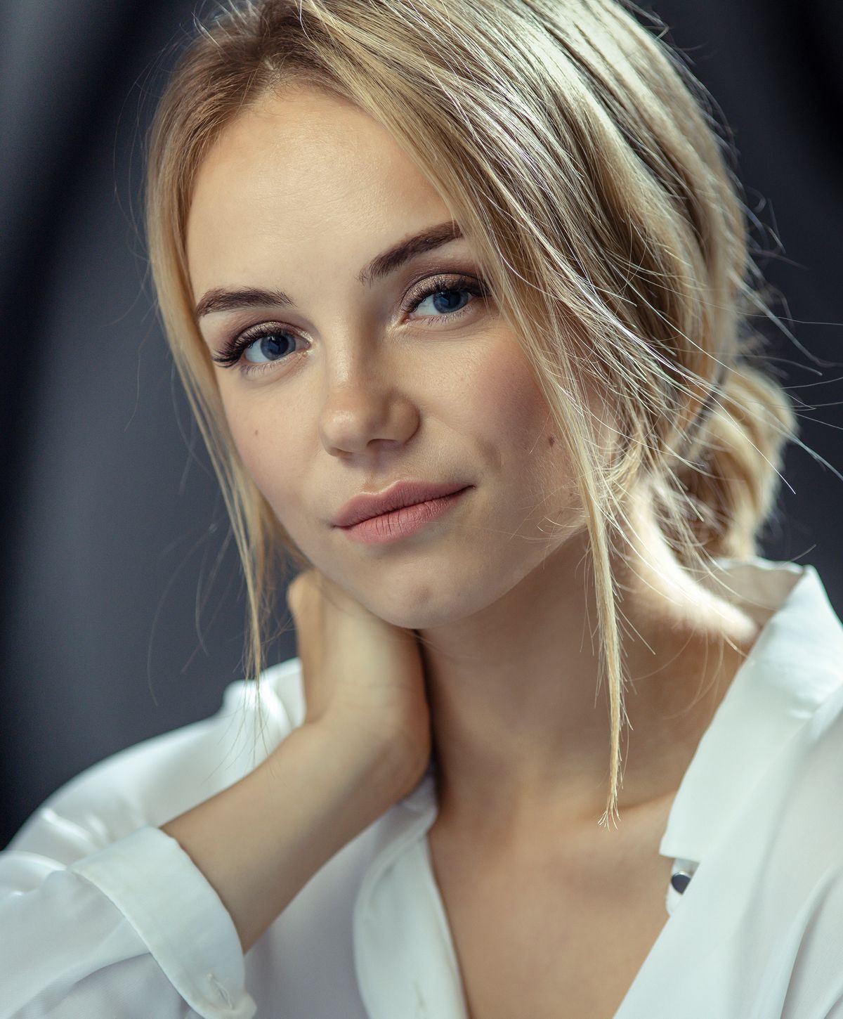 Portrait of a young woman with blonde hair