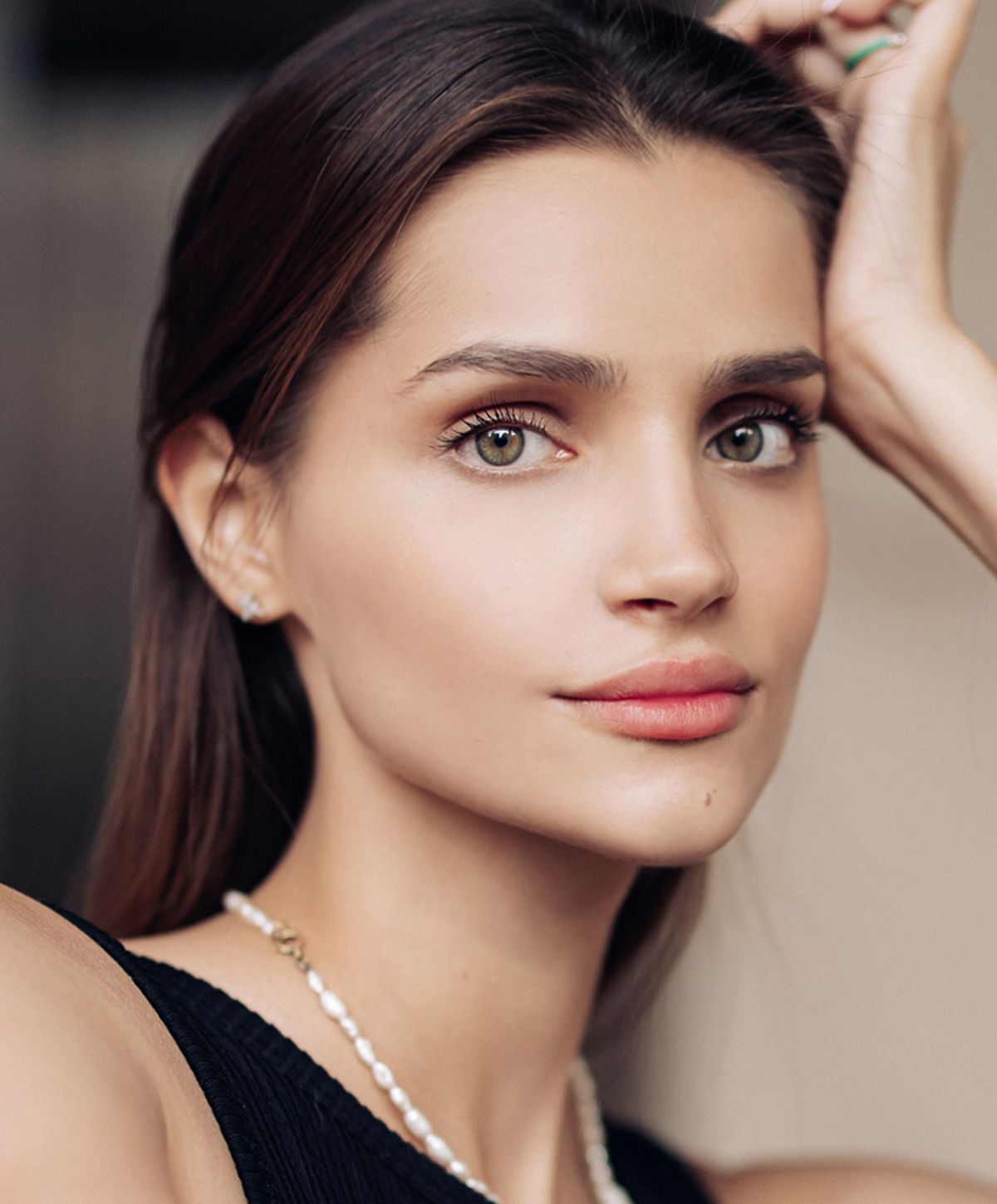 Portrait of a woman with striking features.