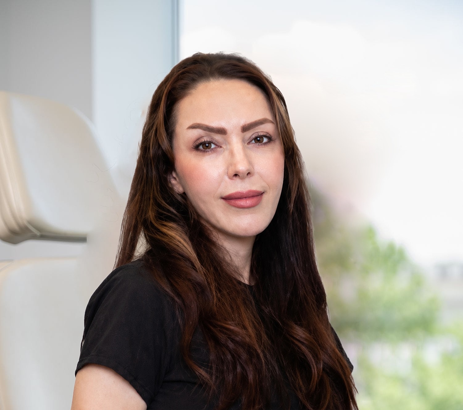 Woman with long hair in a modern setting
